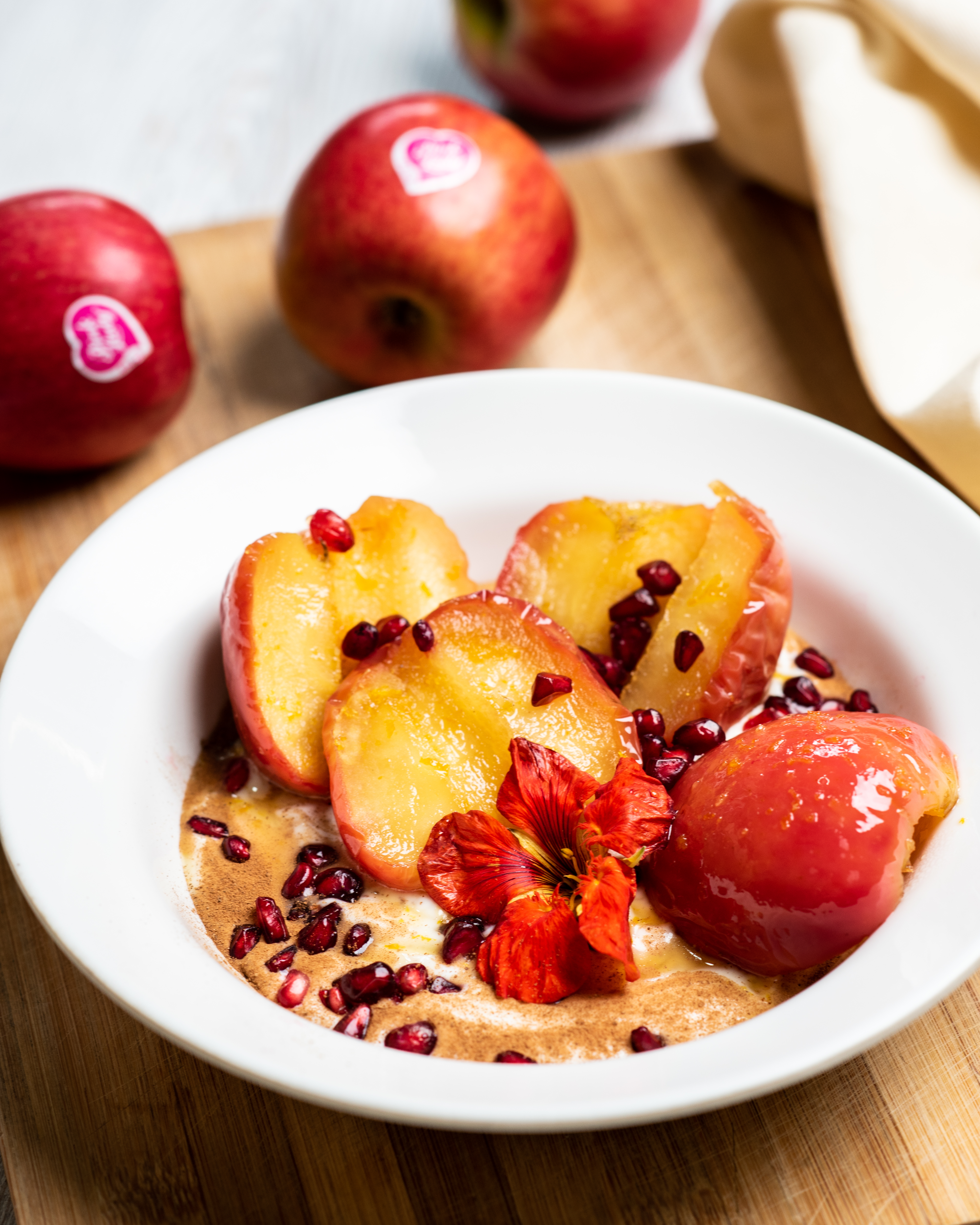 Poached Pink Lady® apples with orange and pomegranate